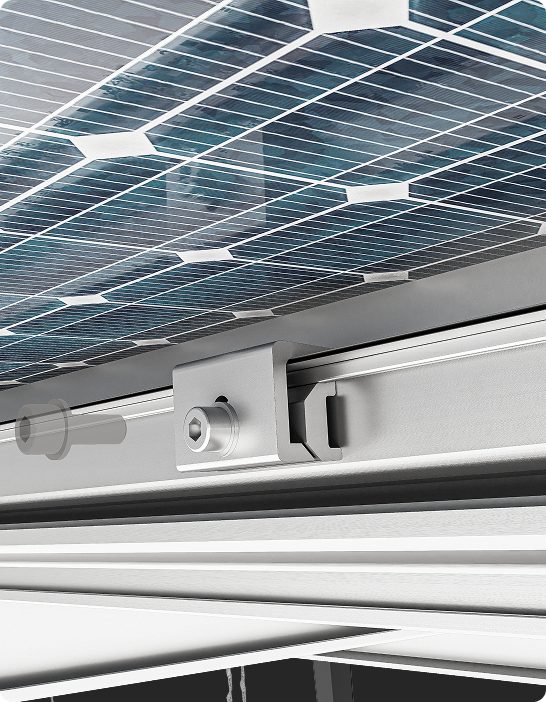 Close-up of a solar panel fixed by a silver mounting clamp with a hex screw to an aluminum rail system.