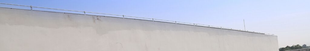 Tilted solar racking system on top of a flat roof.