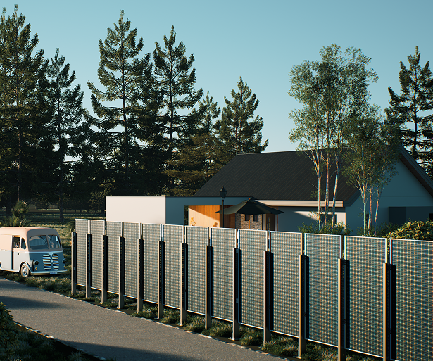 A long fence composed of vertical solar panels runs along a path, with a house, trees, and a parked van behind it.